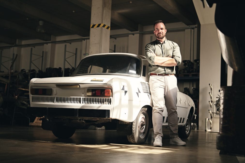Škoda exterior designer, Martin Paclt, with a classic Škoda 100.